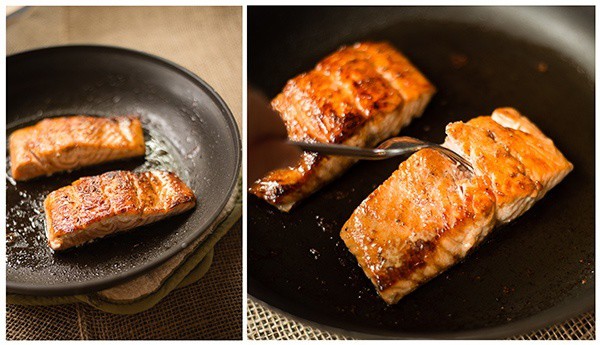 Close up photos of pan fried salmon cooking in a skillet before being placed in the oven to finish.