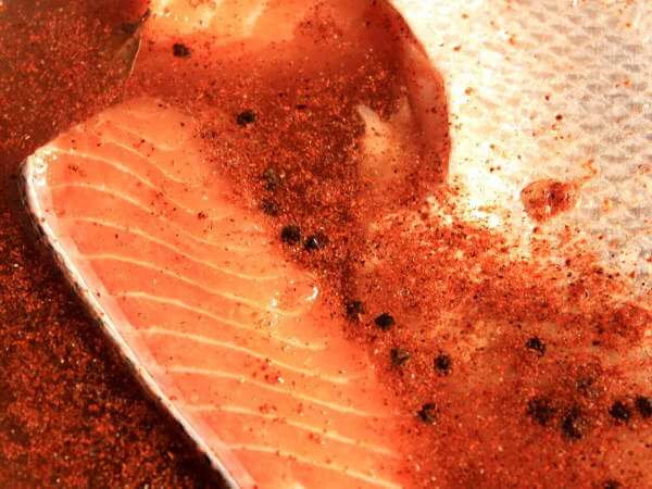 Salmon Fillets Soaking In a Liquid Brine Solution